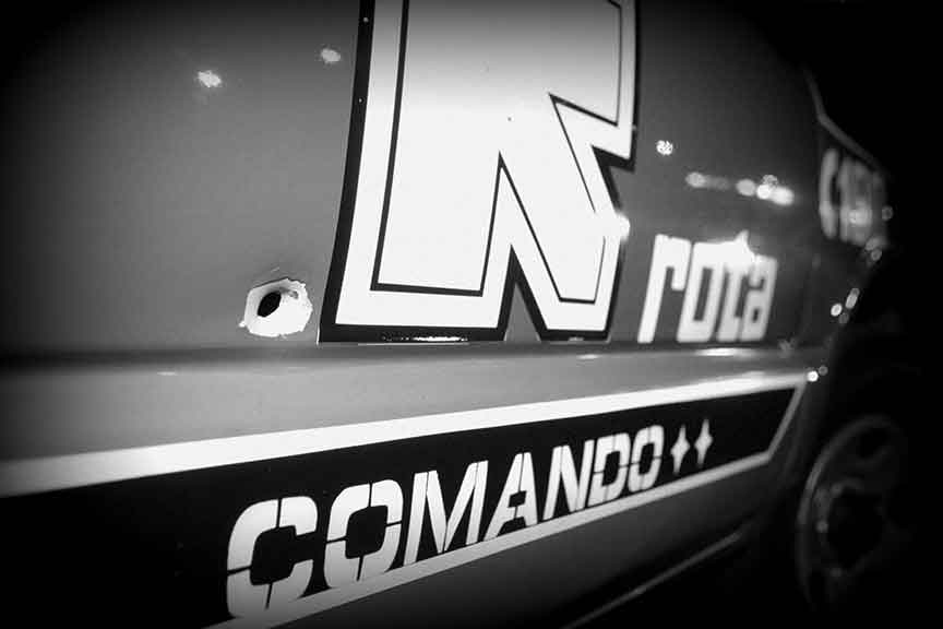 Lateral de carro da Rota perfurada por um tiro