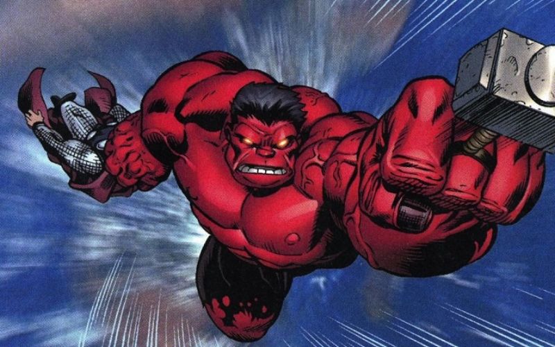 Ilustração do Hulk Vermelho com expressão de raiva, dando um soco no ar. Ele é todo musculoso, usa shorts rasgado e possui cabelos pretos.